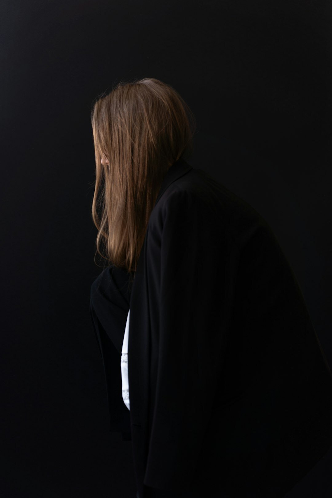 Studio portrait of a professional woman lawyer in a blazer